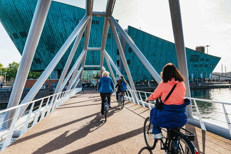 Amsterdam Bike Tour in Small Group + Optional Canal Cruise - Optional canal cruise with drinks and cheese