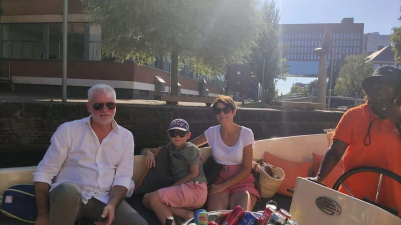 Amsterdam bike tour with a French-speaking guide local! - Dam Square, Westerkerk, and the central canal belt