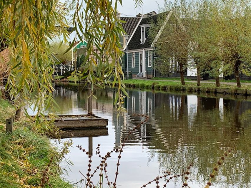 Amsterdam: Countryside Bike Tour and Zaanse Schans Windmills - Riding through wetlands painted by Monet