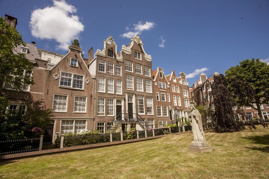 Amsterdam: Hidden Gems & Highlights Guided Bike Tour - Vondelpark brings a quieter stretch