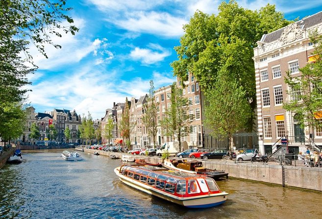 Amsterdam Highlights Bike Tour - Guided in EN/ES/DE/NL - Scharrebiersluis and the working water system