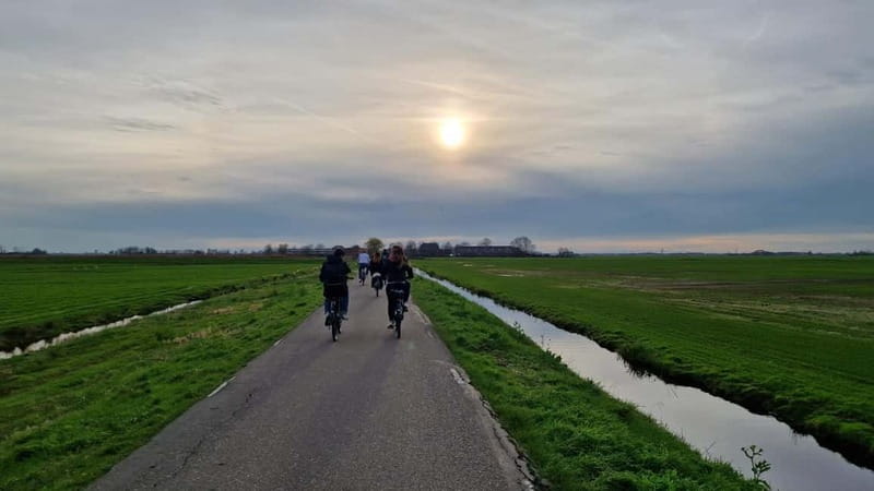 Amsterdam: Leisurely Windmill & Countryside Bike Ride - Riding through Amsterdam Noord
