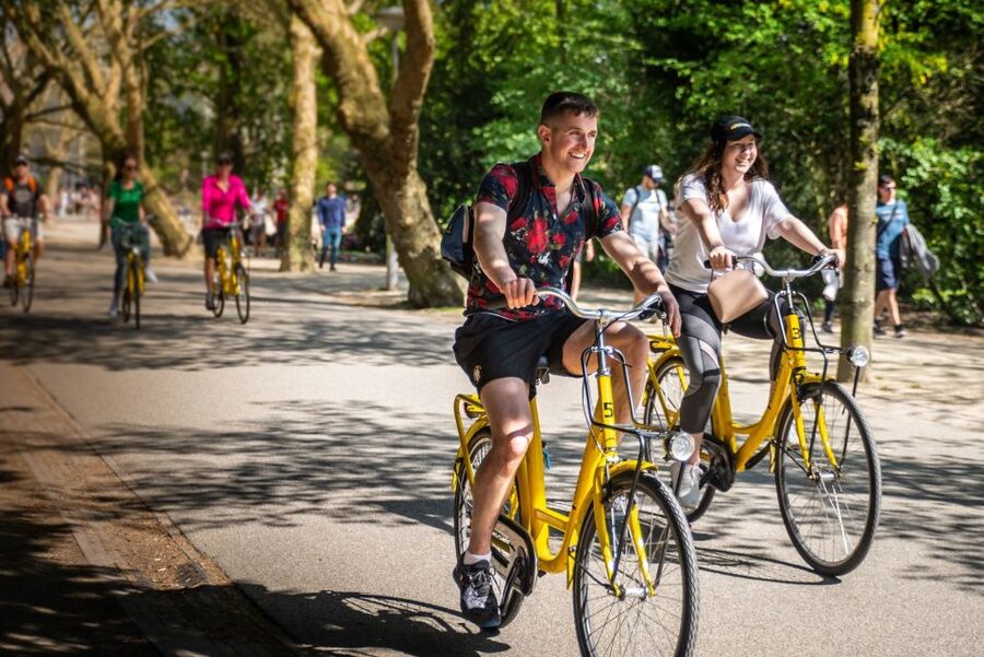 Amsterdam: Relaxed City Highlights Guided Bike Tour - Leidseplein, where Amsterdam changes character