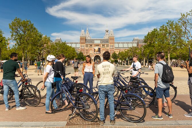 Amsterdam Small-Group Bike Tour With Canal Cruise, Drinks, Cheese - Crossing Amsterdam’s narrow bridge