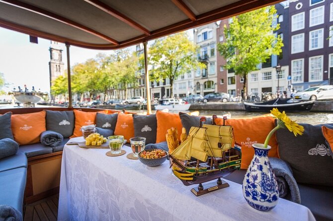 Amsterdam Small-Group Bike Tour With Canal Cruise, Drinks, Cheese - The canal cruise and the move to the dock