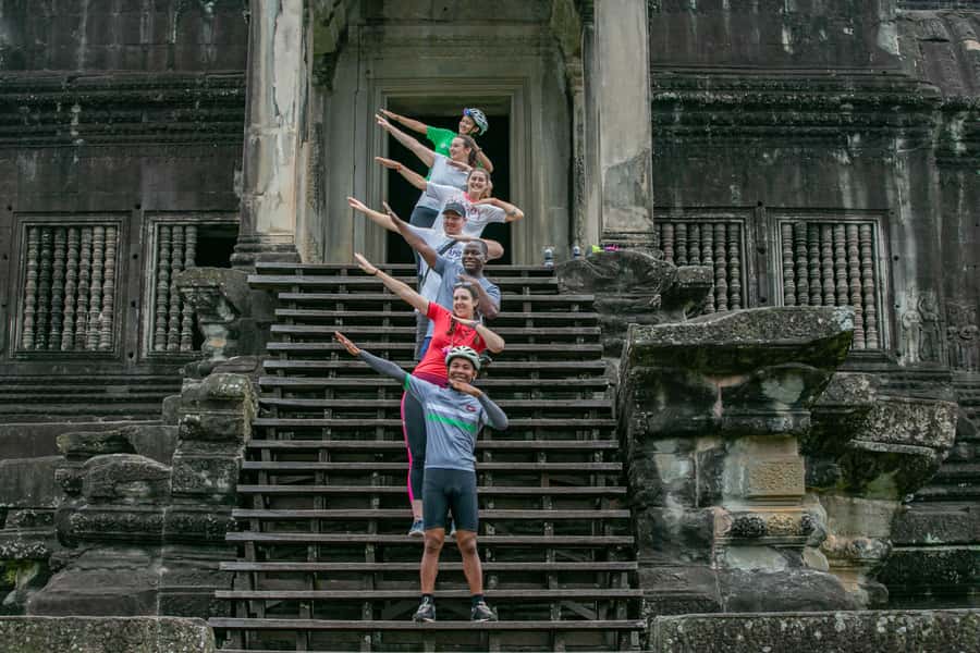 Angkor Wat: Guided Sunrise Bike Tour w/ Breakfast and Lunch - Preah Khan and Ta Prohm, roots and ruins