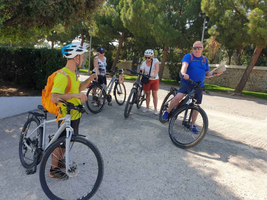 Athens: Authentic neighborhoods & the beach Bike Tour - The modern setting of SNFCC