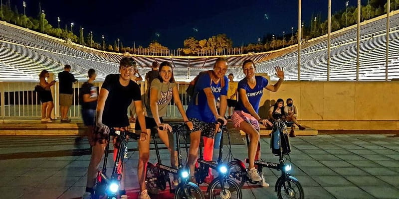Athens: Discover the City Electric Bike Night Tour - Starting downtown with the Academy and Athens Trilogy