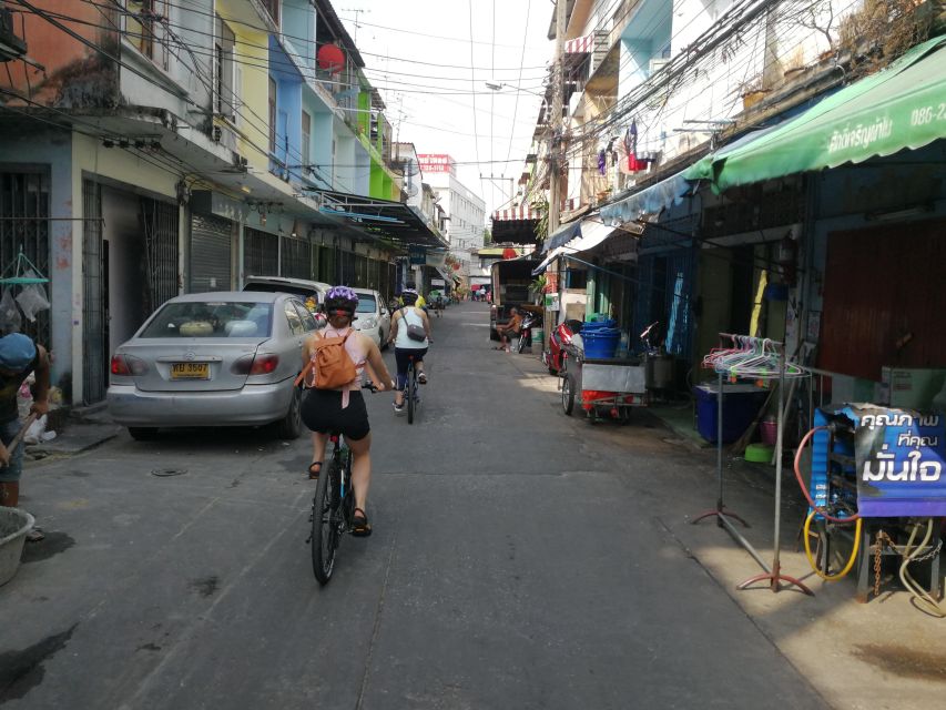 Bangkok: Bike and Canal Boat Tour with Lunch - Wat Ko and the shift from street to water