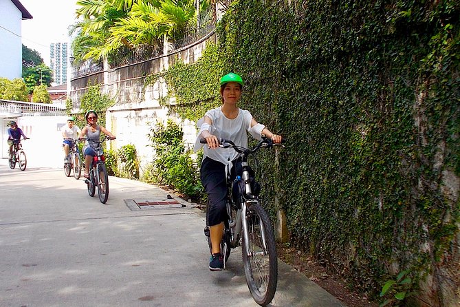 Bangkok Green Oasis 4-Hour Bike Tour with Boat Ride - Elevated paths, mangroves, and the return to the river