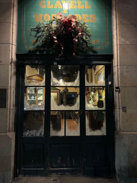 Barcelona: Christmas Lights and Markets Bike Tour - Hospital de Sant Pau after dark