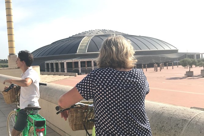 Barcelona E-Bike Guided Tour with Montjuic Hill - Climbing Montjuïc with electric assistance
