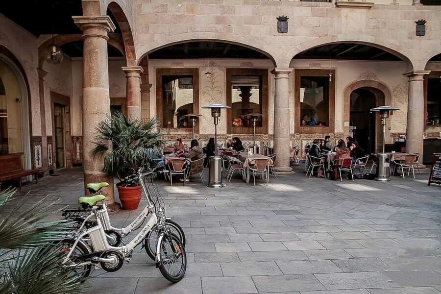 Barcelona: Private 5 Neighborhoods Tour by Electric Bike - Starting beneath the arcades of Plaça Reial