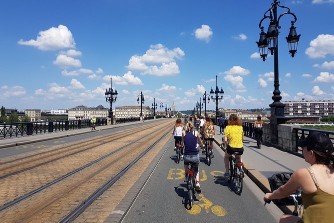 Bordeaux Essentials Sightseeing Bike Tour with a Local Guide - Crossing toward Darwin