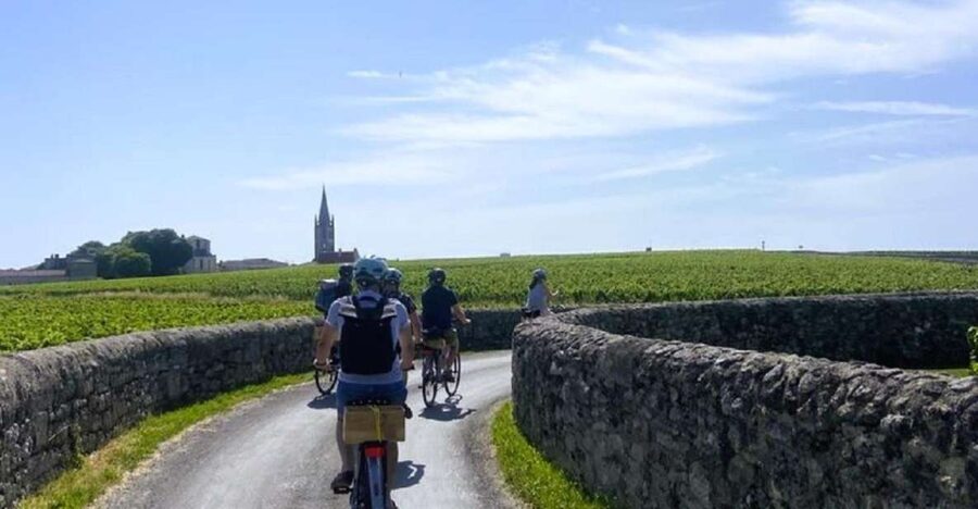 Bordeaux: St-Emilion Vineyards e-Bike Tour with Wine & Lunch - Cycling past Petrus and Château Cheval Blanc