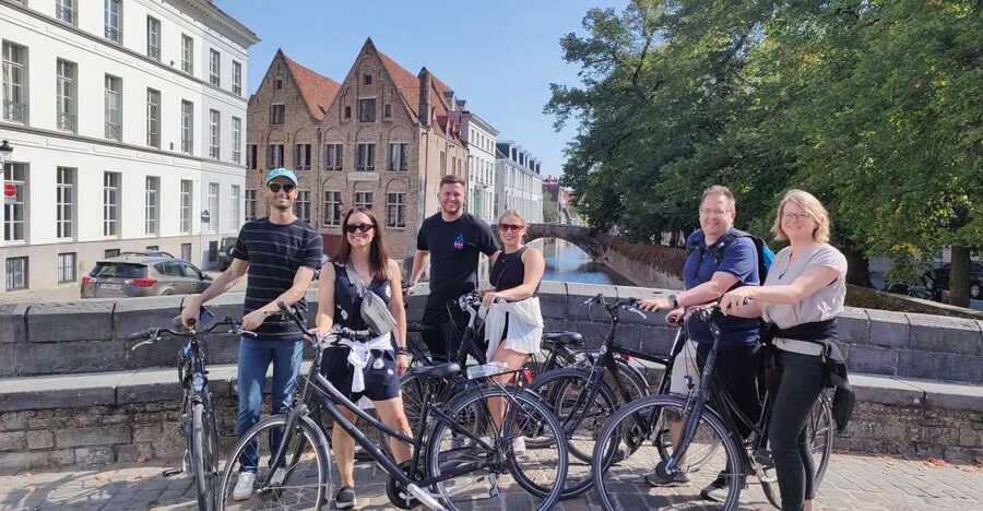 Bruges by bike with family and friends! - City gates, windmills and the old harbor