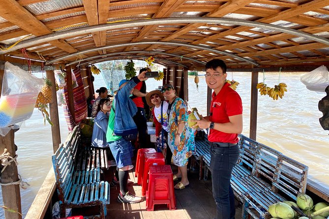 Cai Be Mekong Delta Tour: Cooking Class, Cycling & Craft Villages - Coconut candy, rice popcorn, and local music