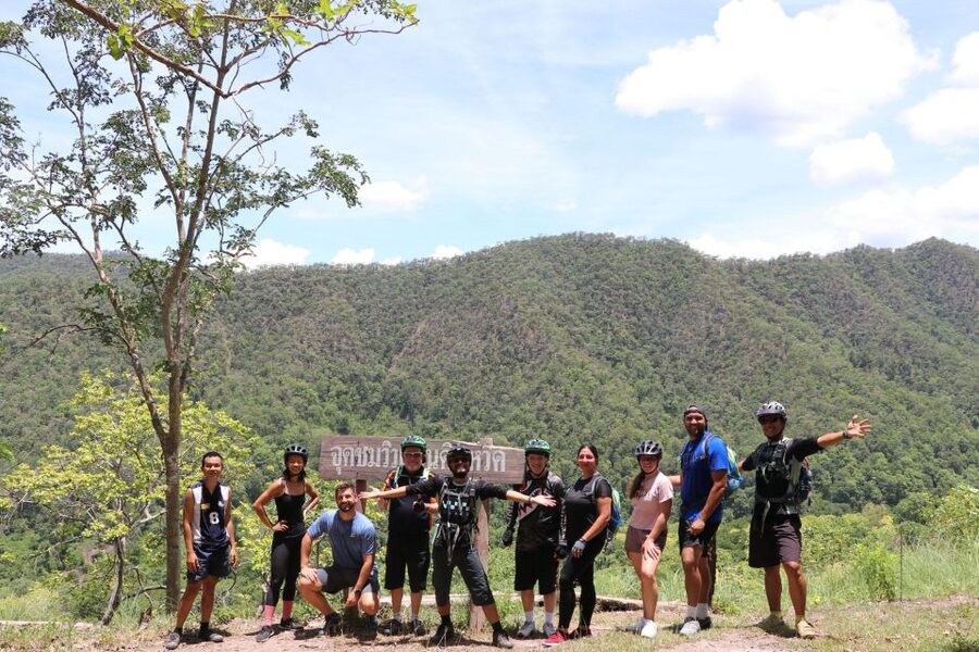 Chiang Mai: Boat Ride and Cycling Tour to Sticky Waterfall - Teak forest trails and the bat cave