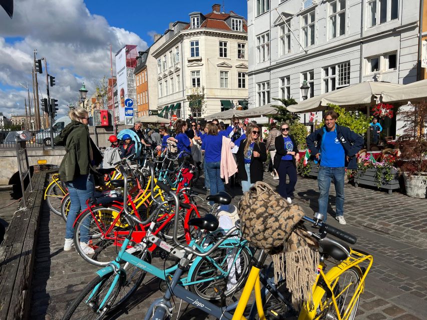 Copenhagen: City Highlights Guided Bike Tour - Nyhavn, colorful streets, and harbor views