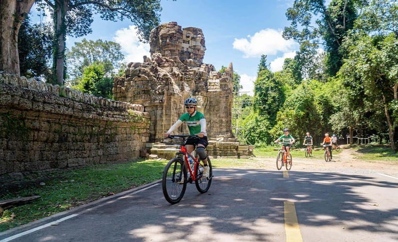 Cycle Angkor Backroad Bike Tour / E-Bike or Tuk Tuk - Bayon Temple and its many stone faces