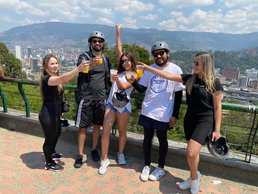 E-Bike City Tour Medellin with Local beer and Snacks - Meeting at San Joaquin Church
