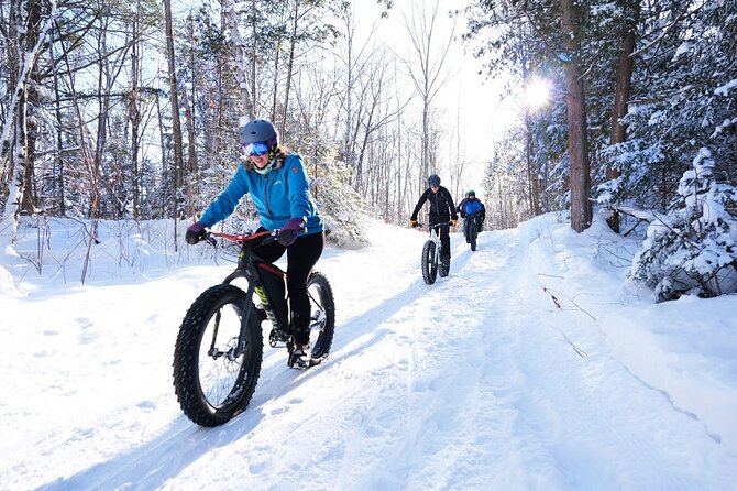 Electric Fat Biking Adventure in Banff | Small Group Adventure - The Banff town sign and the Banff Springs Hotel