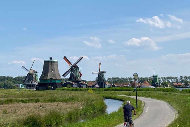 Escape Amsterdam: E-Bike to Zaanse Schans Windmills & Zaandam - Landsmeer: narrow paths and open farm country