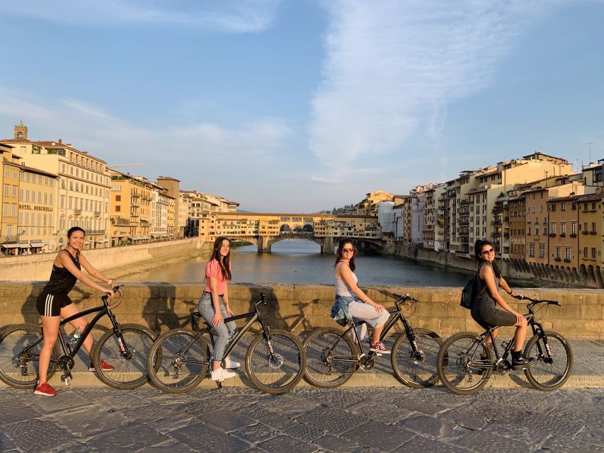 Florence: 2-Hour Guided Sightseeing Bike Tour - Crossing the Arno at Ponte Santa Trinita
