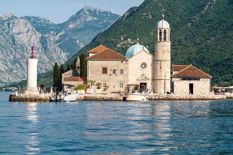 From Kotor: Boating, Kayaking, & Cycling Tour - A speedboat ride with a sense of place