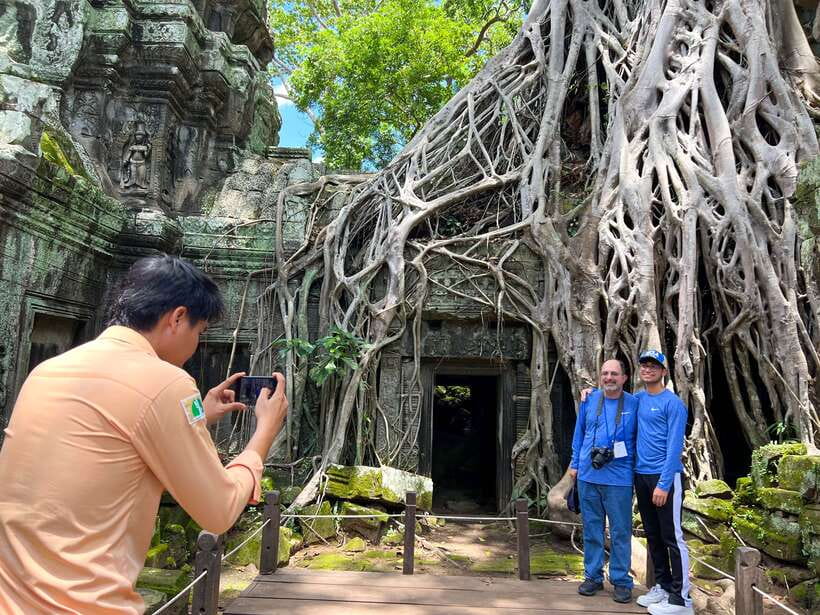 From Siem Reap: Angkor Wat Sunrise and Temples E-Bike Tour - Bayon, the smiling faces, and Angkor Thom