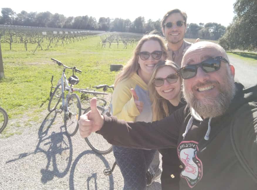 From Sitges: Cycling Tour with Winery visit and Tasting - Cava, wine, and three glasses at the table
