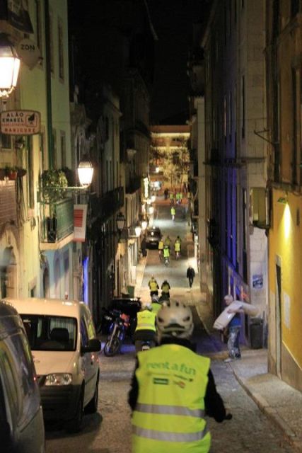 Go Lisbon by Night Electric Bike Tour - Riding Lisbon as daylight fades
