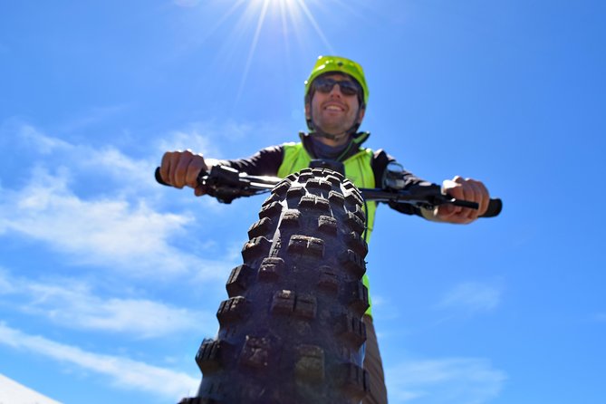 Guided Electric Mountain Bike & Sea Kayak Tour in Akaroa - 8:30 a.m. starts with an electric climb