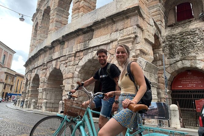 Highlights and hidden gems Verona Bike Tour - Ponte Pietra and the climb to Castel San Pietro