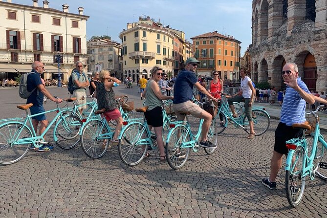 Highlights and hidden gems Verona Bike Tour - Crossing the Scaliger Bridge to San Zeno