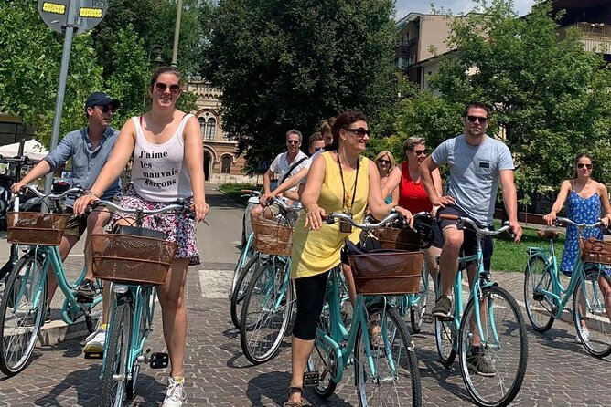 Highlights and hidden gems Verona Bike Tour - Porta Borsari and the market life of Piazza delle Erbe