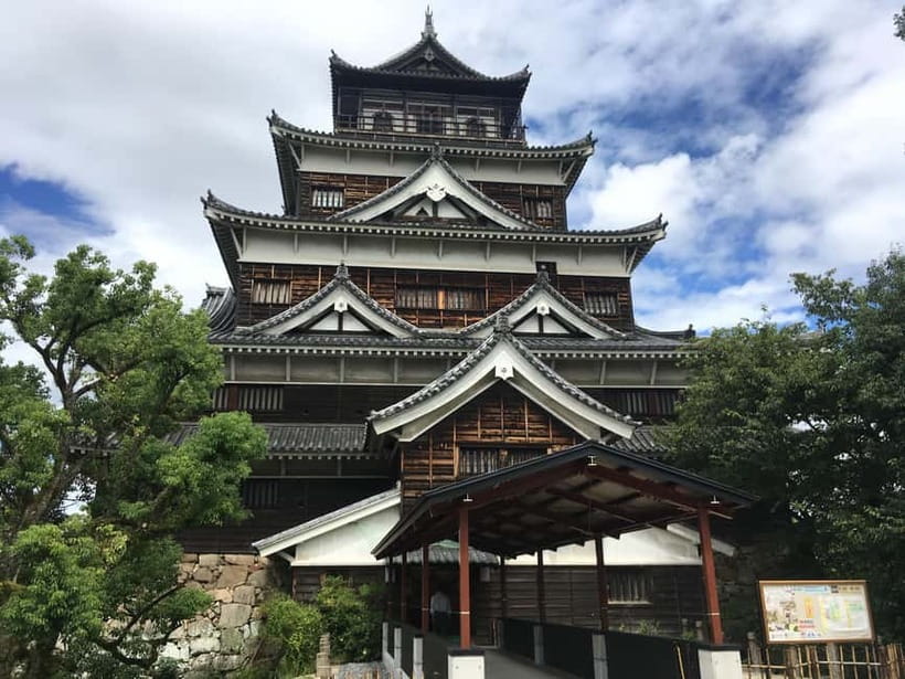 Hiroshima: City and Miyajima Bike and Boat Tour - The train and ferry to Miyajima