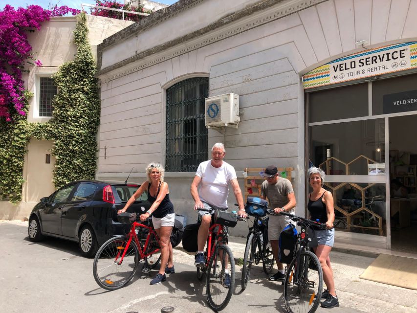 Lecce: City Highlights Guided Tour by Bike - Porta Napoli and the city’s changing eras