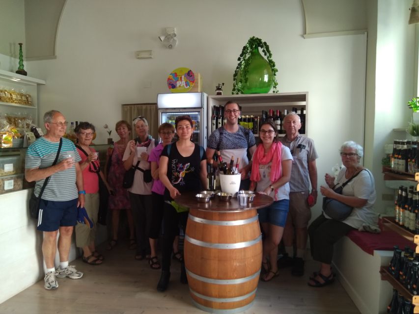 Lecce: Guided Tour & Wine Tasting by Bike - Porta Napoli and Lecce’s ceremonial entrance
