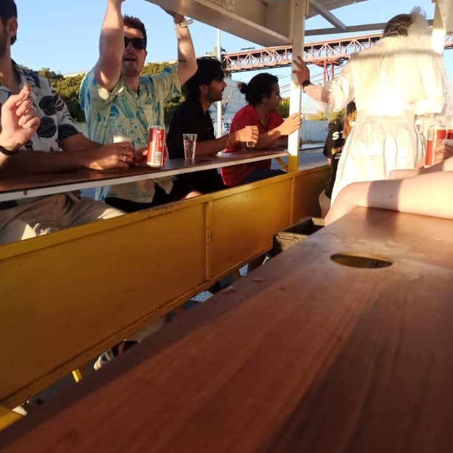 Lisbon: 1-Hour Beer, Sangria or Wine Bike Sightseeing Tour - Drinks, music, and the social side