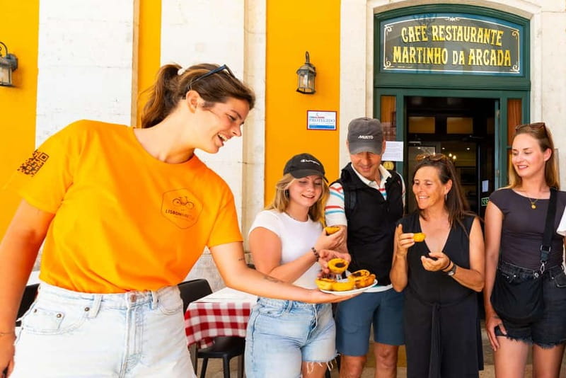 Lisbon: Bike Tour from Lisbon to Belém + Liquor & Pastry - Rolling past Lisbon’s grand central streets
