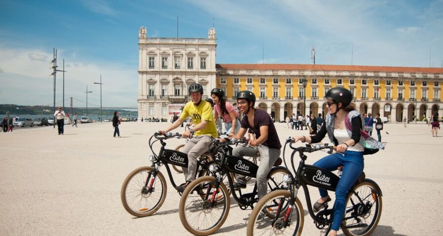 Lisbon: Hills, Alfama, and Mouraria Tour by Electric Bike - Commerce Square and the riverfront beginning