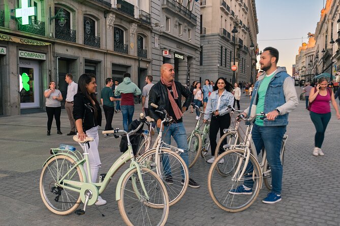 Madrid at Night: Vintage Bike Tour of City Highlights - Plaza de España and the Royal Palace