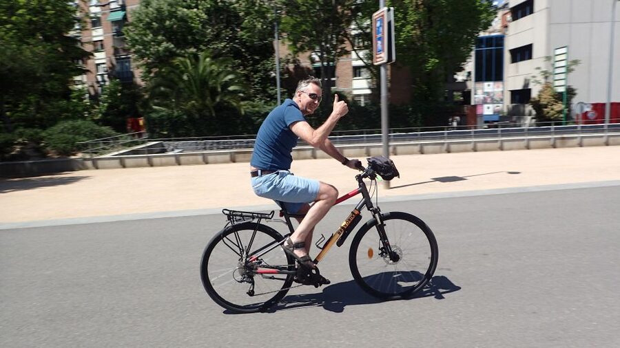 Madrid City Guided Bike/E-Bike Tour for Small Groups - Chueca, San Antón Market, and Malasaña