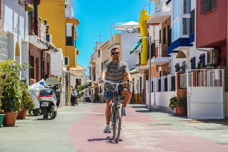 Malaga: Castle Hill and Fisherman Village E-Bike Tour - Street Art and Malaga’s Changing Edges