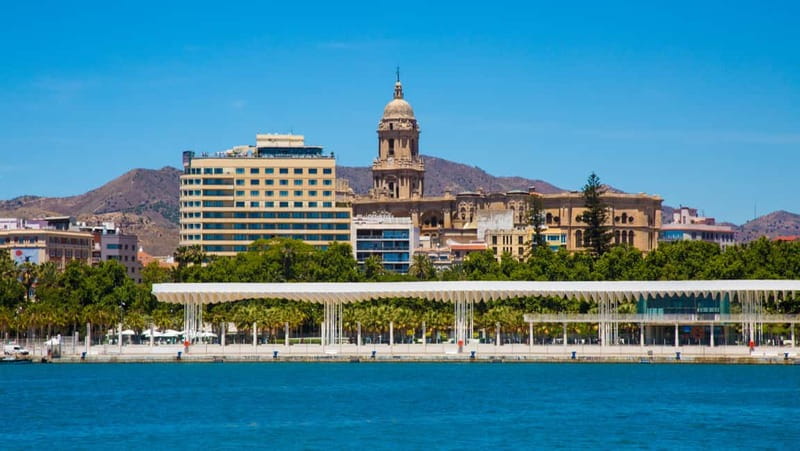 Malaga: Castle Hill and Fisherman Village E-Bike Tour - Starting Through Malaga’s Old Center