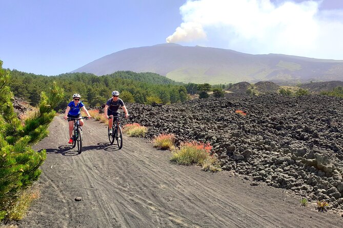 Mountain Biking Etna by MTB or E-Bike - Following the Pista Altomontana toward the lava