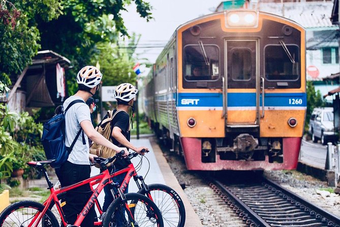 Must-Try: Hidden Bangkok Bike and Food Tour - The ride back passes local streets and a train market