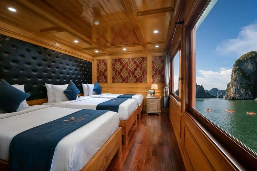 Ninh Binh: Lan Ha Bay 2D 1N cruises- bike tour, kayak, meals - Kayaking through Dark and Bright Cave
