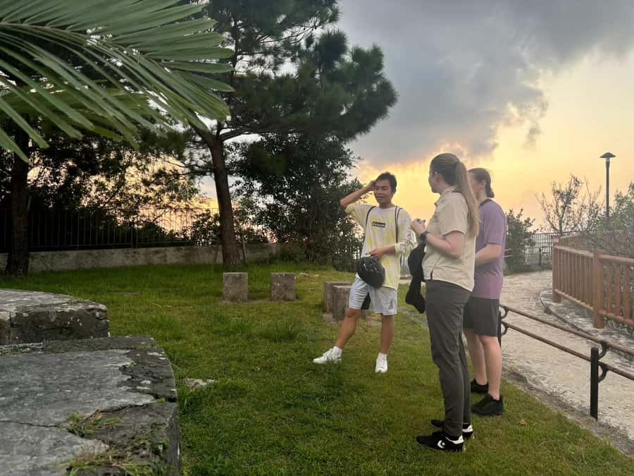 Okinawa: Afternoon Cycling Tour with Local Guide - Climbing toward Shuri by electric bicycle